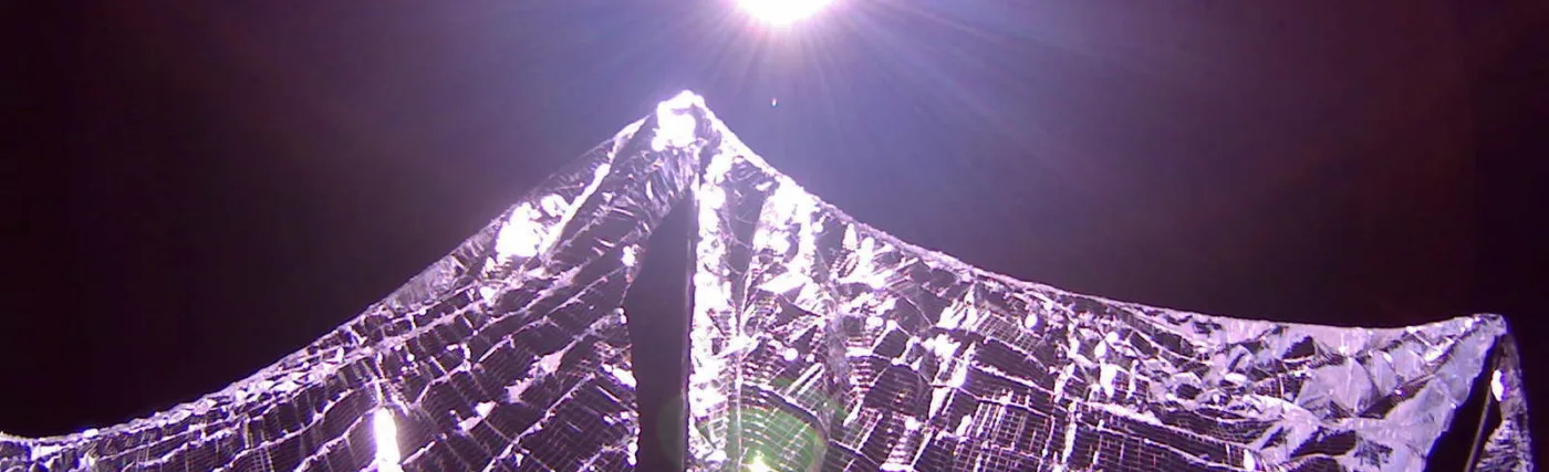 LightSail 1 captured this image of its deployed solar sails in Earth orbit on 8 June 2015. LightSail's cameras are fisheye lenses with a 185-degree field of view, which distort the shape of the sails and make them look curved in this image.