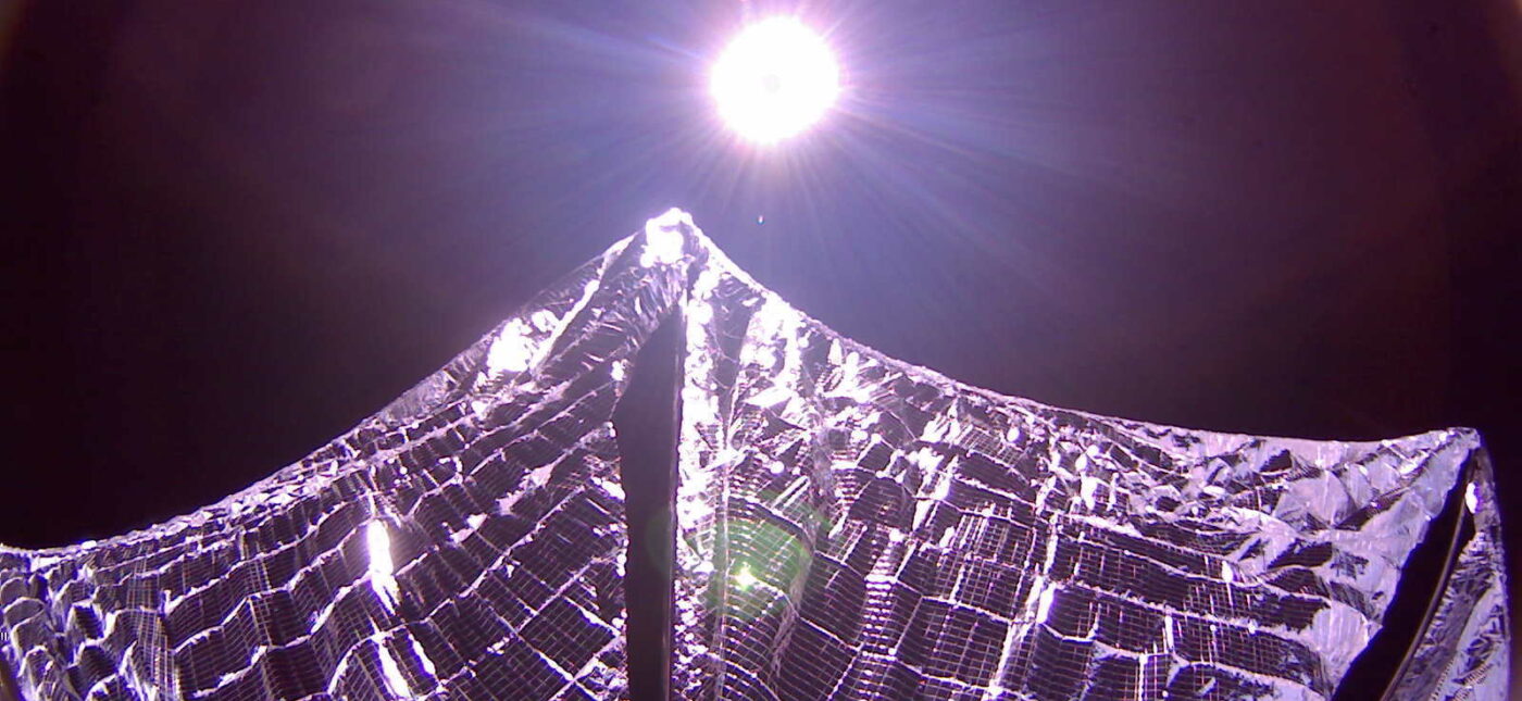 LightSail 1 captured this image of its deployed solar sails in Earth orbit on 8 June 2015. LightSail's cameras are fisheye lenses with a 185-degree field of view, which distort the shape of the sails and make them look curved in this image.