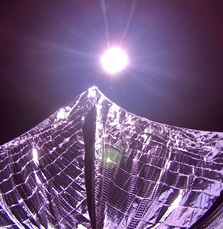 LightSail 1 captured this image of its deployed solar sails in Earth orbit on 8 June 2015. LightSail's cameras are fisheye lenses with a 185-degree field of view, which distort the shape of the sails and make them look curved in this image.