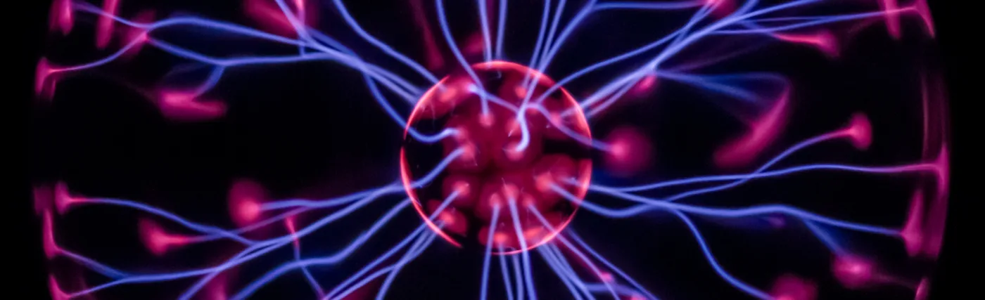 A Plasma ball photographed from above. The 1/60s exposure is needed to capture the plasma filaments rather than blurring them to ribbons.