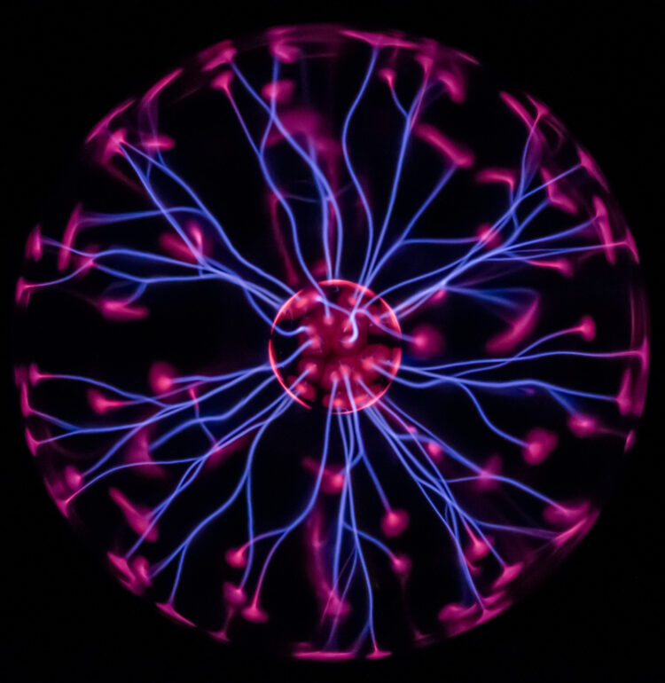 A Plasma ball photographed from above. The 1/60s exposure is needed to capture the plasma filaments rather than blurring them to ribbons.