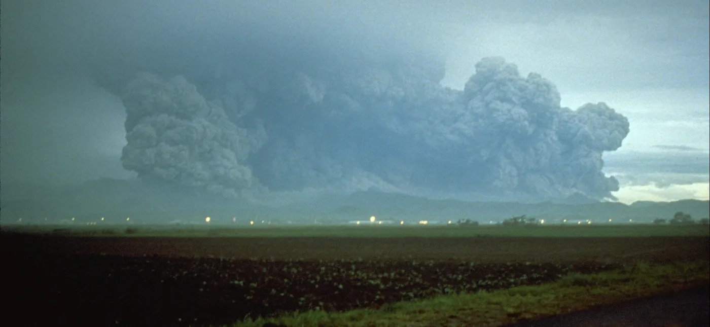 Mount Pinatubo at daybreak on June 15, 1991, a few minutes after the start of the climactic eruption.