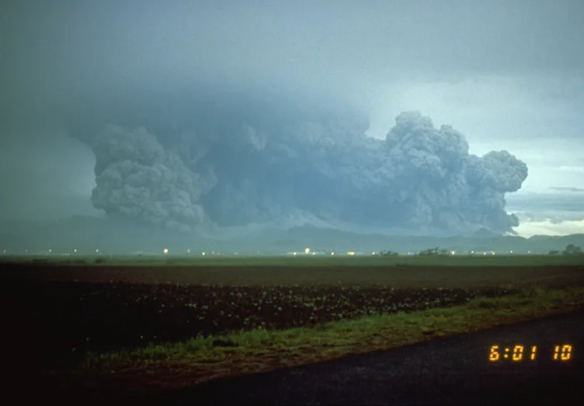 Mount Pinatubo at daybreak on June 15, 1991, a few minutes after the start of the climactic eruption.