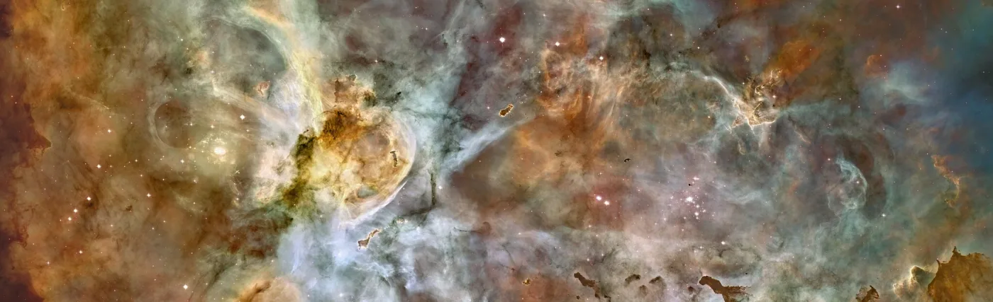 A composite image of NGC 3372 based on data from Hubble Space Telescope (HST) and NOIRLab. The image is a composite of 48 frames and depicts an area 50 light-years wide. The false color image was created using the following formula: red for sulfur, green for hydrogen, and blue for oxygen emissions.