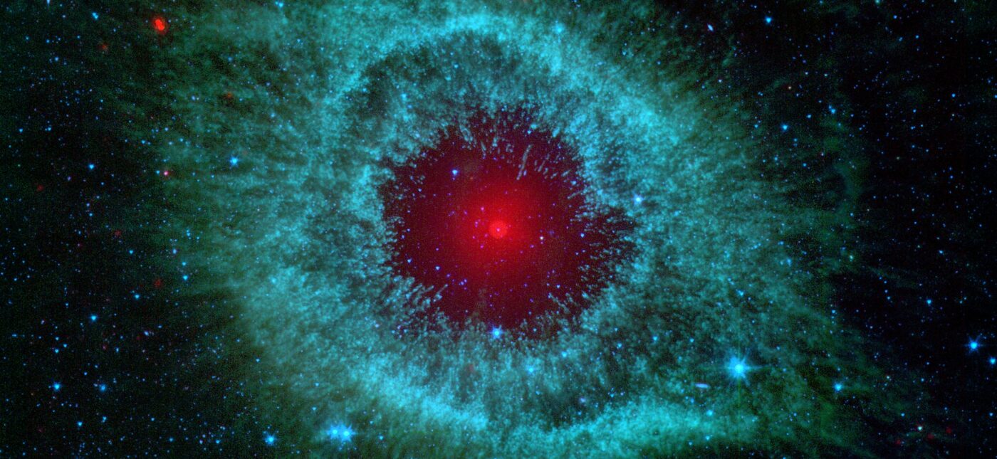 This infrared image from NASA's Spitzer Space Telescope shows the Helix Nebula, a cosmic starlet often photographed by amateur astronomers for its vivid colors and eerie resemblance to a giant eye.