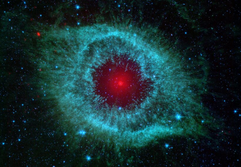 This infrared image from NASA's Spitzer Space Telescope shows the Helix Nebula, a cosmic starlet often photographed by amateur astronomers for its vivid colors and eerie resemblance to a giant eye.