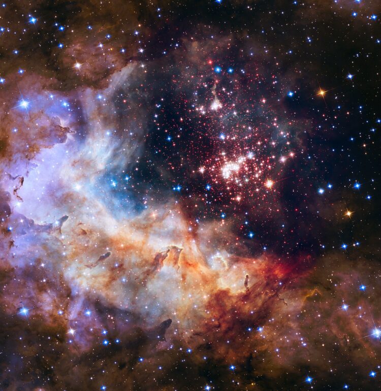 The star cluster Westerlund 2 in the Milky Way galaxy, with an estimated age of about one or two million years. It contains some of the hottest, brightest, and most massive stars known. The cluster resides inside a stellar breeding ground known as Gum 29, located 20,000 light-years away in the constellation Carina.