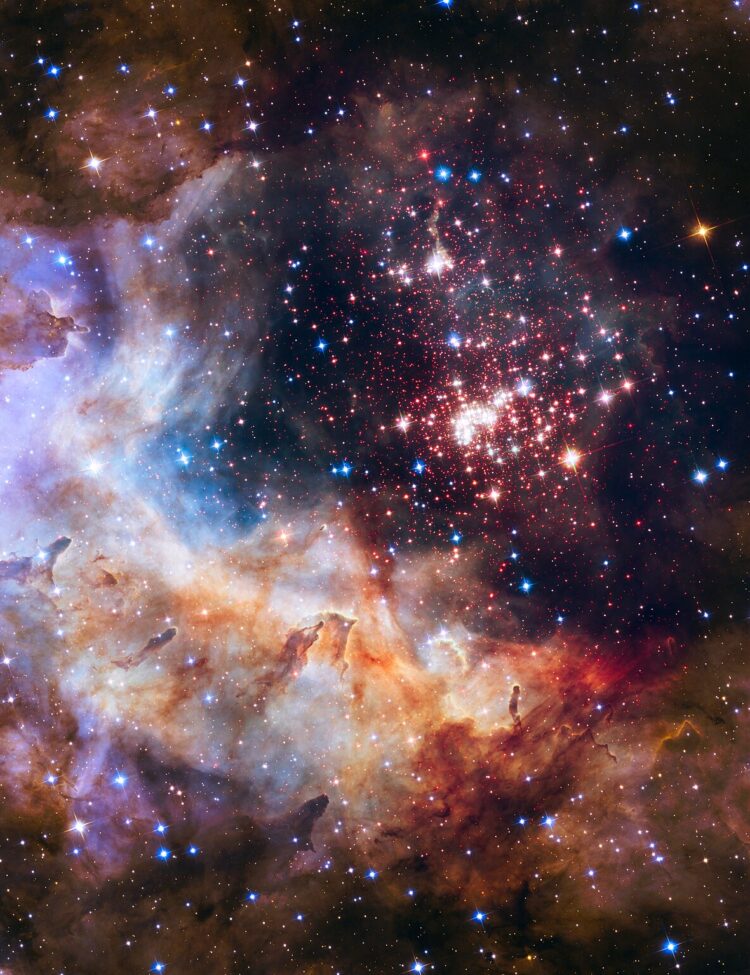 The star cluster Westerlund 2 in the Milky Way galaxy, with an estimated age of about one or two million years. It contains some of the hottest, brightest, and most massive stars known. The cluster resides inside a stellar breeding ground known as Gum 29, located 20,000 light-years away in the constellation Carina.