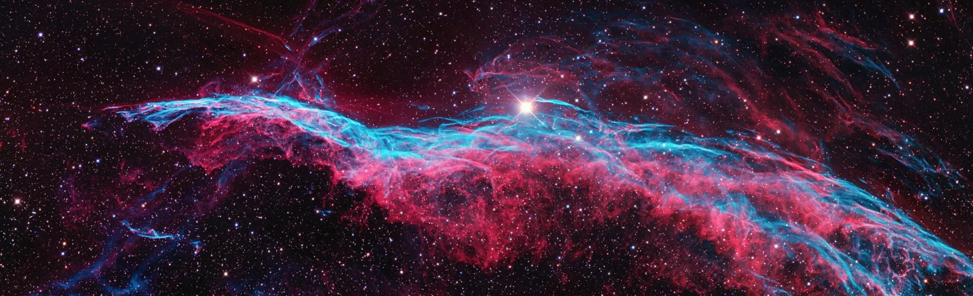 NGC 6960 or the Veil Nebula is a cloud of heated and ionized gas and dust in the constellation Cygnus. The analysis of the emissions from the nebula indicate the presence of oxygen, sulfur, and hydrogen. This is also one of the largest, brightest features in the x-ray sky.