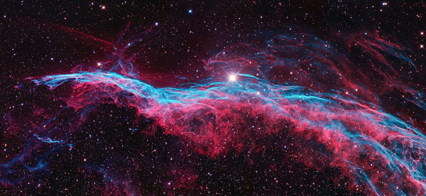 NGC 6960 or the Veil Nebula is a cloud of heated and ionized gas and dust in the constellation Cygnus. The analysis of the emissions from the nebula indicate the presence of oxygen, sulfur, and hydrogen. This is also one of the largest, brightest features in the x-ray sky.