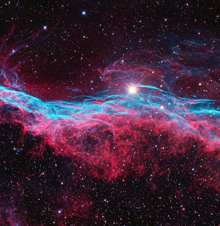 NGC 6960 or the Veil Nebula is a cloud of heated and ionized gas and dust in the constellation Cygnus. The analysis of the emissions from the nebula indicate the presence of oxygen, sulfur, and hydrogen. This is also one of the largest, brightest features in the x-ray sky.
