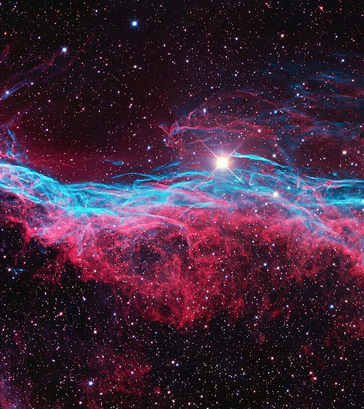 NGC 6960 or the Veil Nebula is a cloud of heated and ionized gas and dust in the constellation Cygnus. The analysis of the emissions from the nebula indicate the presence of oxygen, sulfur, and hydrogen. This is also one of the largest, brightest features in the x-ray sky.