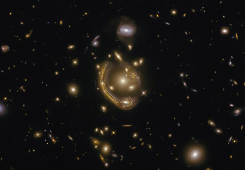 The narrow galaxy elegantly curving around its spherical companion in this image is a fantastic example of a truly strange and very rare phenomenon.