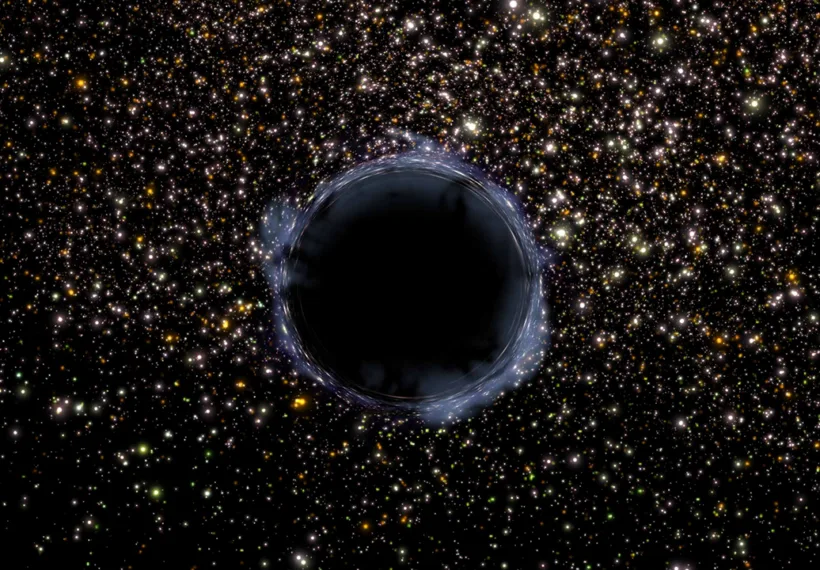 Artist's view of a black hole in a globular cluster. A black hole is an infinitely small and dense region where space is so tightly warped by gravity that not even light can escape.