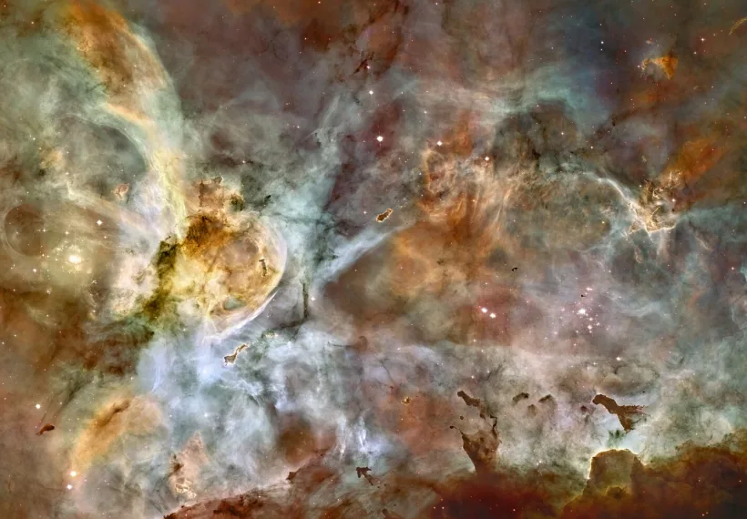 In celebration of the 17th anniversary of the launch and deployment of NASA's Hubble Space Telescope, a team of astronomers is releasing one of the largest panoramic images ever taken with Hubble's cameras. It is a 50-light-year-wide view of the central region of the Carina Nebula where a maelstrom of star birth - and death - is taking place.