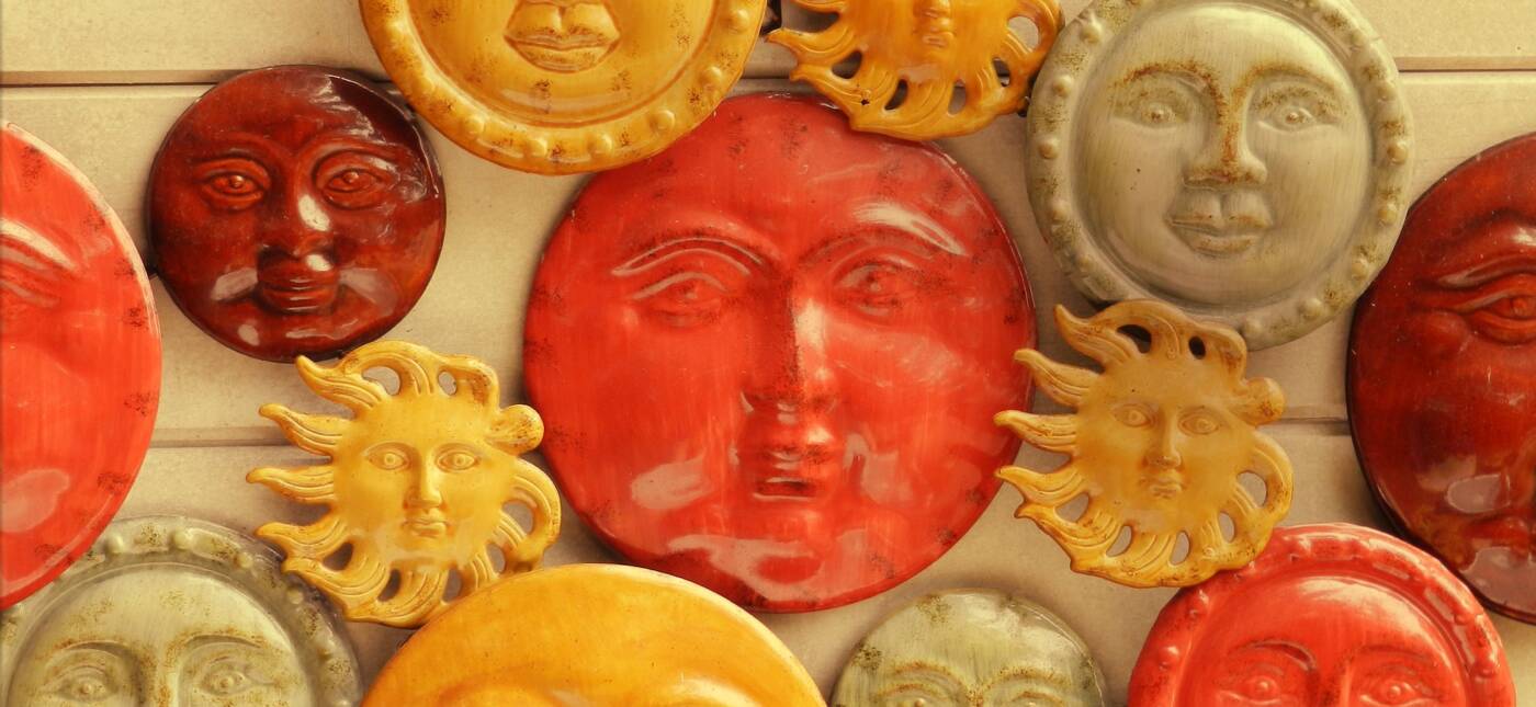 A photograph of artwork of different faces by CasparGirl