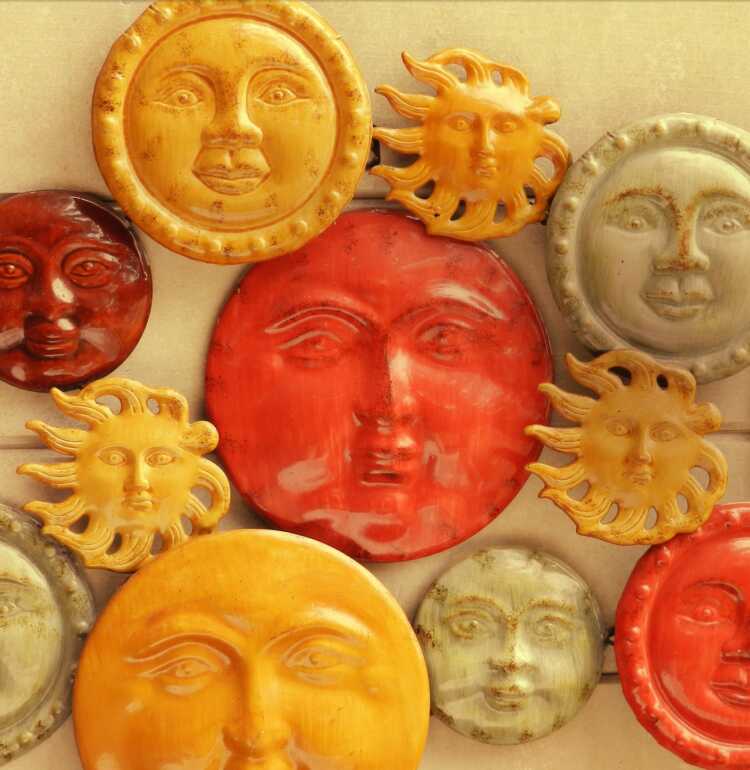 A photograph of artwork of different faces by CasparGirl