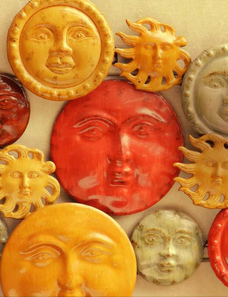 A photograph of artwork of different faces by CasparGirl