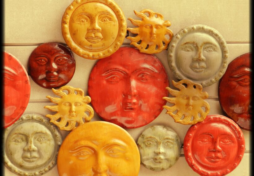 A photograph of artwork of different faces by CasparGirl