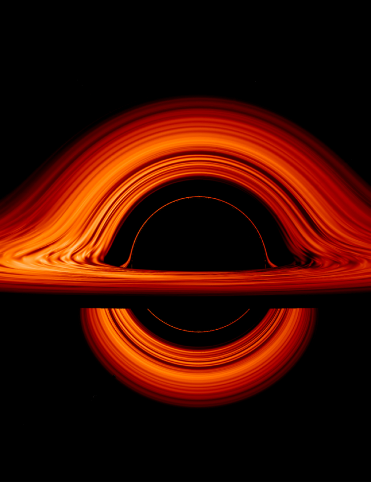 Seen nearly edgewise, the turbulent disk of gas churning around a black hole takes on a crazy double-humped appearance. The black hole’s extreme gravity alters the paths of light coming from different parts of the disk, producing the warped image.