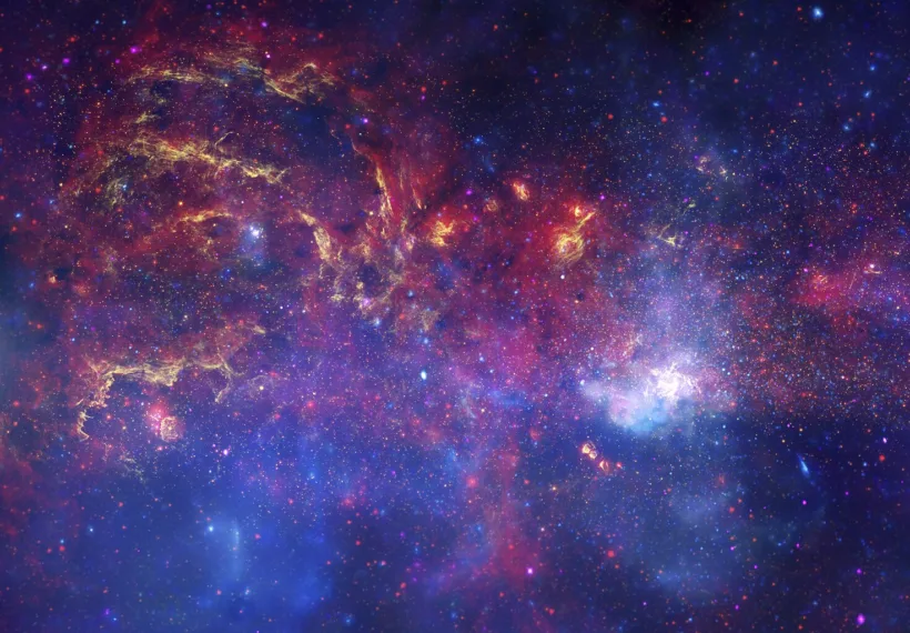 In celebration of the International Year of Astronomy 2009, NASA's Great Observatories -- the Hubble Space Telescope, the Spitzer Space Telescope, and the Chandra X-ray Observatory -- have produced a matched trio of images of the central region of our Milky Way galaxy. Each image shows the telescope's different wavelength view of the galactic center region, illustrating the unique science each observatory conducts. In this spectacular image, observations using infrared light and X-ray light see through the obscuring dust and reveal the intense activity near the galactic core.