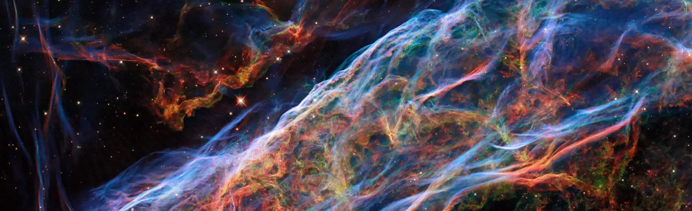 This object was featured in a previous Hubble photo release, but now new processing techniques have been applied, bringing out fine details of the nebula’s delicate threads and filaments of ionised gas.
