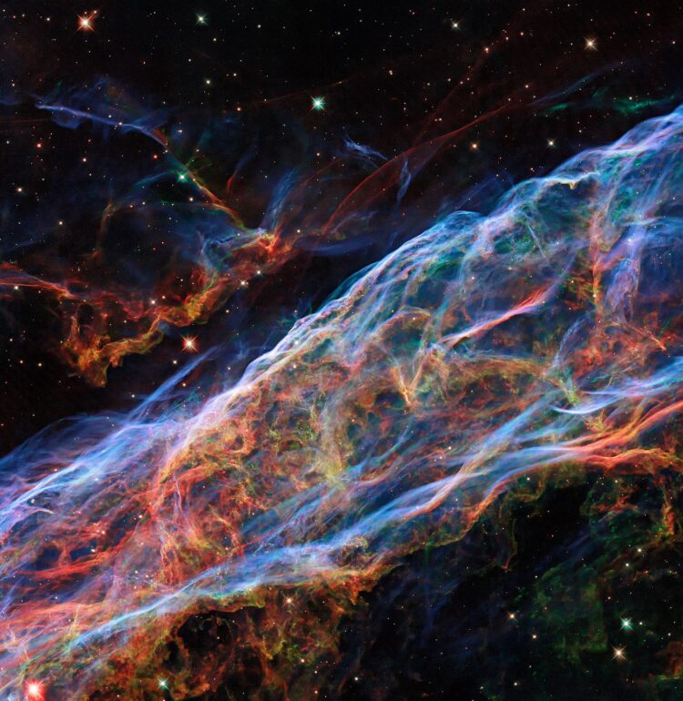 This object was featured in a previous Hubble photo release, but now new processing techniques have been applied, bringing out fine details of the nebula’s delicate threads and filaments of ionised gas.