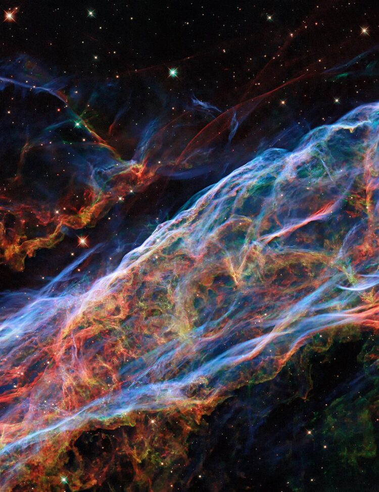 This object was featured in a previous Hubble photo release, but now new processing techniques have been applied, bringing out fine details of the nebula’s delicate threads and filaments of ionised gas.