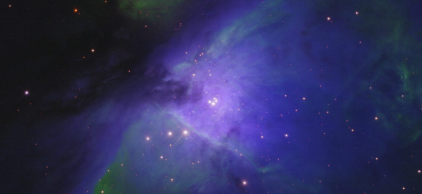 This image of the Orion Nebula is taken in an exotic palette that maps near infrared data to the red image channel, [S II] emission to the green image channel, and [O III] emission to the blue image channel.