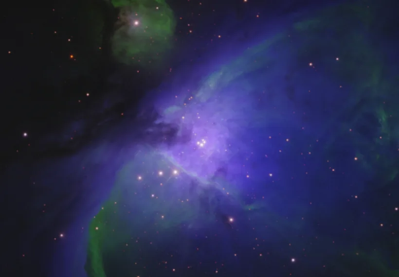 This image of the Orion Nebula is taken in an exotic palette that maps near infrared data to the red image channel, [S II] emission to the green image channel, and [O III] emission to the blue image channel.