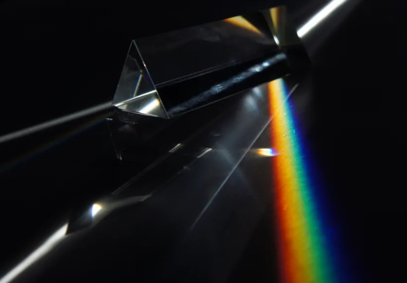light is dispersed in seven colours by triangular prism