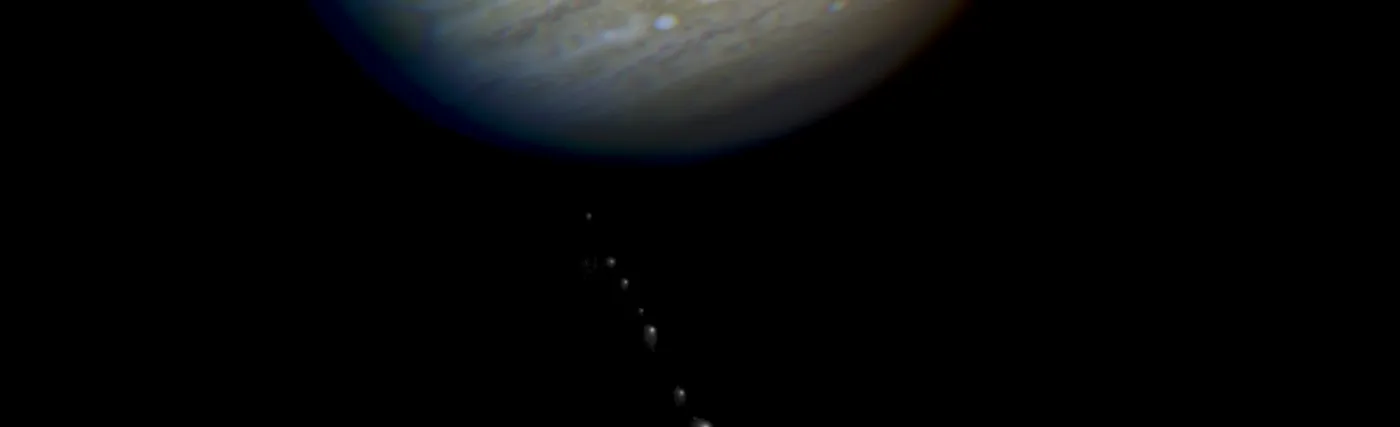 This is a composite photo, assembled from separate images of Jupiter and Comet P/Shoemaker-Levy 9, as imaged by the Wide Field & Planetary Camera 2 (WFPC2), aboard. NASA's Hubble Space Telescope (HST).