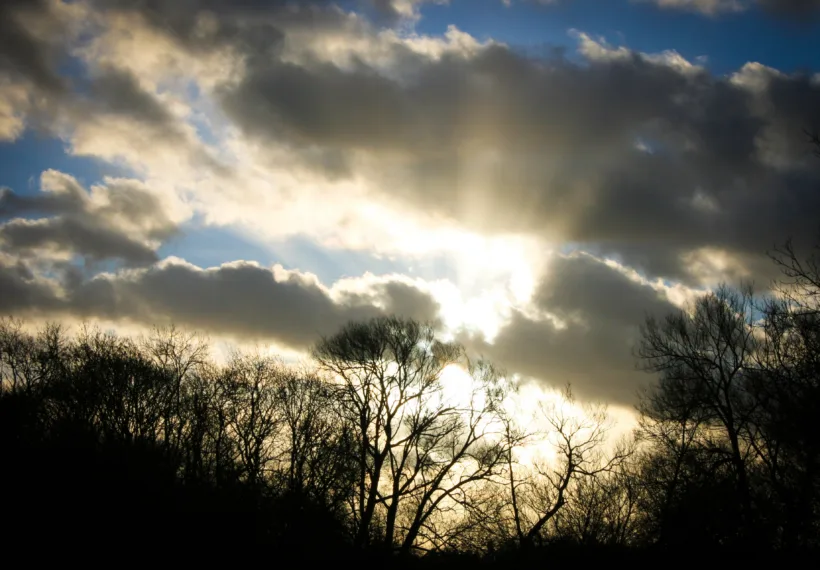 Rays of sun bursting through the clouds