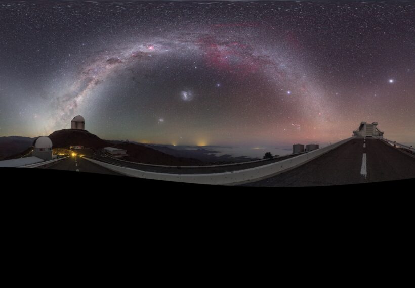 This striking image was captured using a fish-eye lens, giving it the distinctive look of a circular window, peering into a different world. Here the landscape at the [/public/teles-instr/lasilla/ La Silla] observatory in Chile can be seen wrapped around the edge, with the constellations of the Zodiac splashed across the early morning sky.