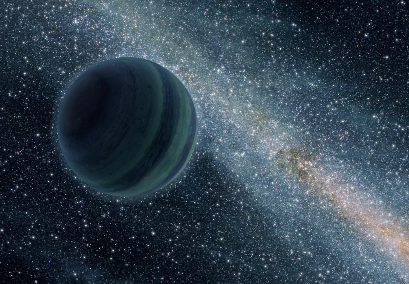 This artist's conception illustrates a Jupiter-like planet alone in the dark of space, floating freely without a parent star. Astronomers recently uncovered evidence for 10 such lone worlds, thought to have been "booted," or ejected, from developing solar systems.