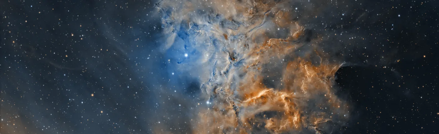 Flaming Star Nebula (IC 405) captured with narrowband filters and processed in the Hubble Palette. Captured by amateur astronomer Chuck Ayoub in Redford, Michigan, USA.