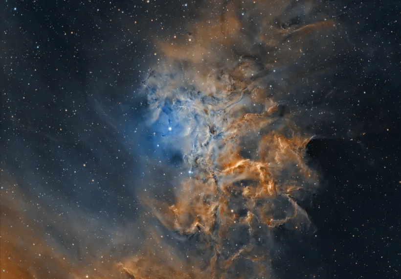 Flaming Star Nebula (IC 405) captured with narrowband filters and processed in the Hubble Palette. Captured by amateur astronomer Chuck Ayoub in Redford, Michigan, USA.