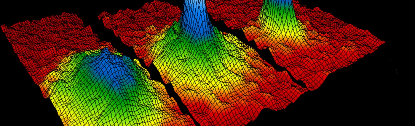 The graphic shows three-dimensional successive snap shots in time in which the atoms condensed from less dense red, yellow and green areas into very dense blue to white areas.