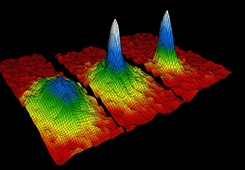 The graphic shows three-dimensional successive snap shots in time in which the atoms condensed from less dense red, yellow and green areas into very dense blue to white areas.